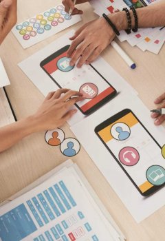 Mobile app developers choosing icons for interface